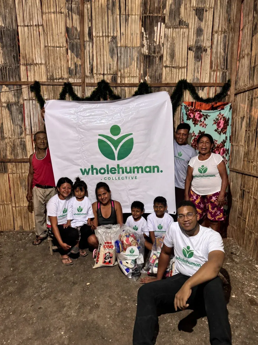 A family receiving a food and essentials delivery